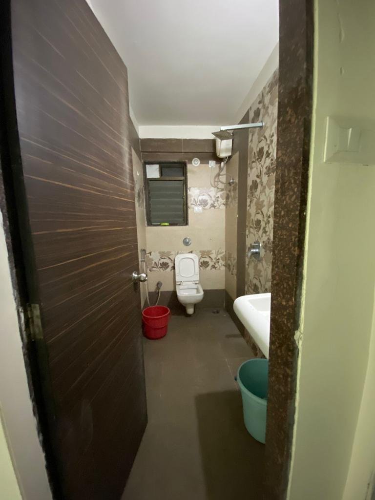 Clean bathroom with geyser at PG Airoli